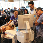 Residents and fellows practice ultrasound skills through simulation exercise.