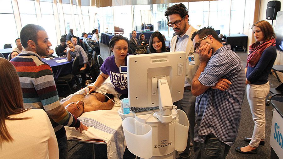 Residents and fellows practice ultrasound skills through simulation exercise.