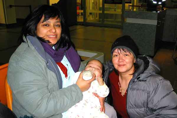 Pictured with her adopted son, Nathan, and foster mother, Monica, in 2004.